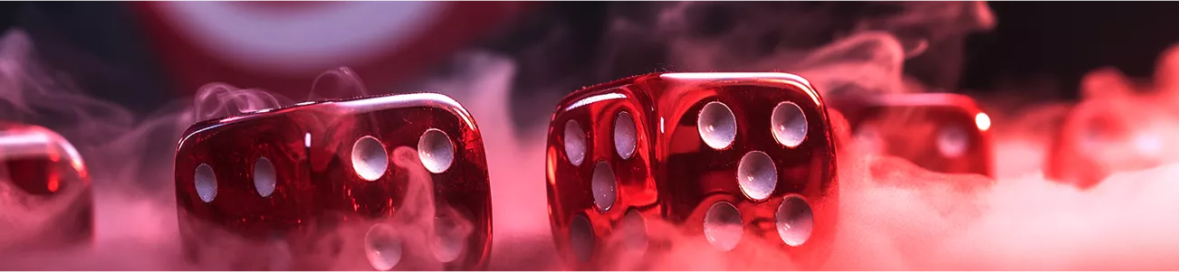Burning red dice in flames